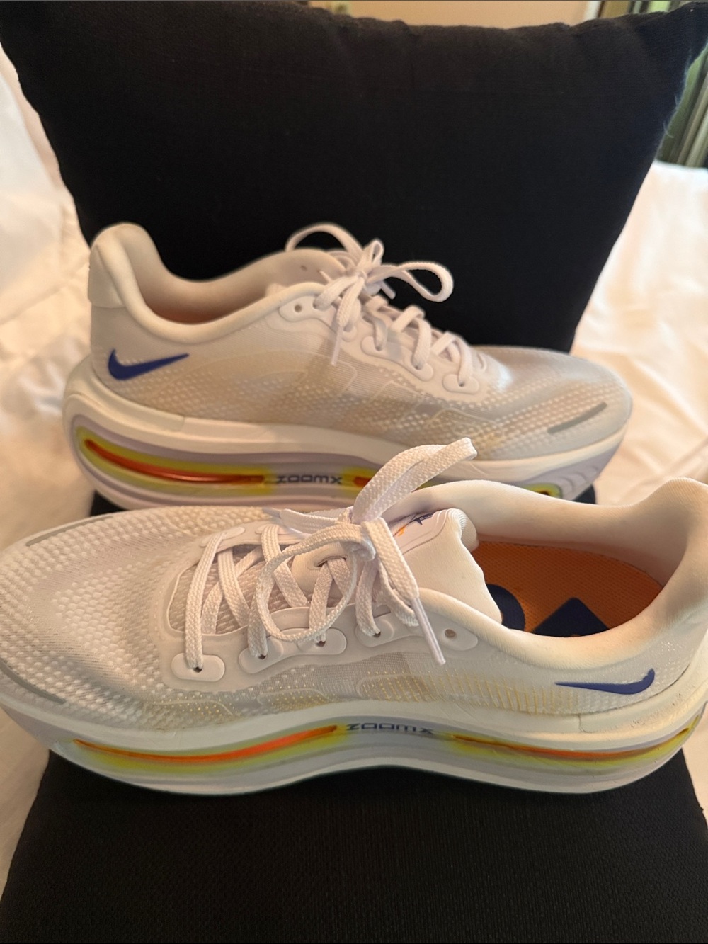 Nike Kids White Sneakers with Blue Swoosh and Rainbow Midsole